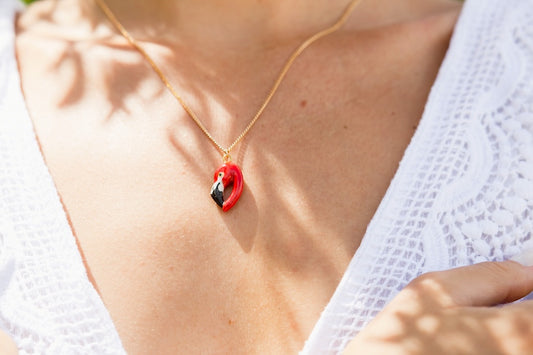 Collier tête de flamant rose